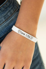 Load image into Gallery viewer, Love Life - White Leather Silver "Love Live" Stamped Wrap Bracelet - Demetra's Bling Boutique
