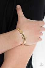 Load image into Gallery viewer, Conquer Your Fears - Gold Centerpiece Stamped "CONQUER" Bracelet - Demetra's Bling Boutique
